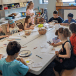 Kids doing crafts in Hamline Church